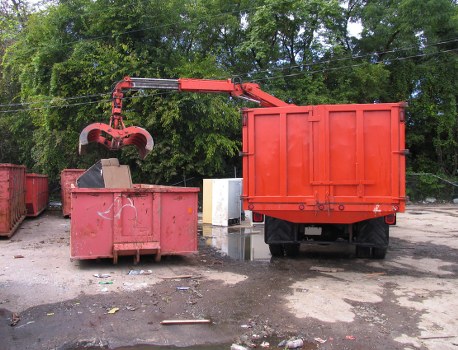 Movers handling furniture in a Kings Cross residence
